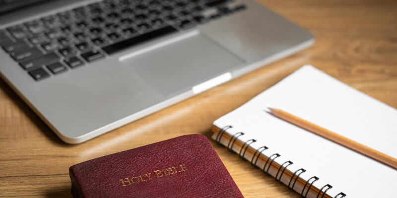 laptop with Bible and notebook